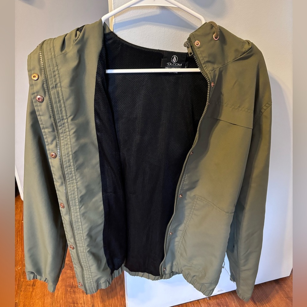 Green rain jacket